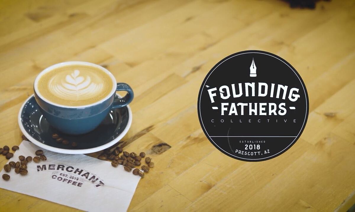 Latte with rosetta art at Merchant Coffee inside Founding Fathers Collective — coffee shops Prescott.